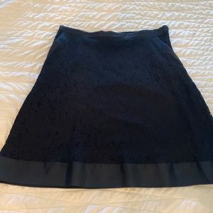 Isaac Mizrahi black skirt with side pockets. Size 12.